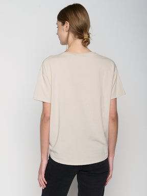 Off White: Lässiges T-Shirt aus Bio-Baumwoll-Mix für Damen [22838]